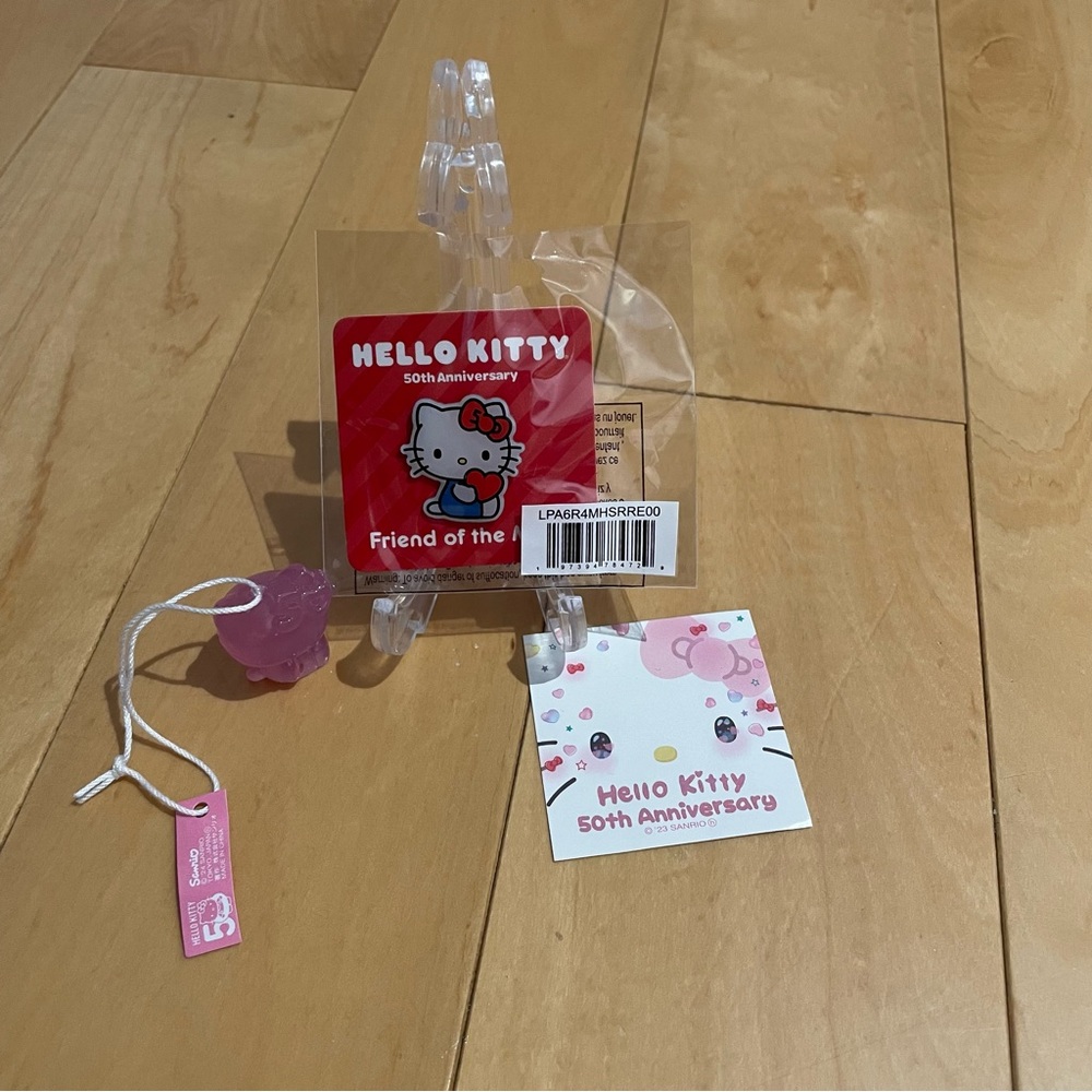 New hello kitty pin and trinket set